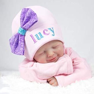 Newborn Girl's White Hat with Purple and Turquoise Script Name Personalized Beanie with Bow - Embroidery